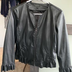 Black leather jacket with ruffles on sleeve